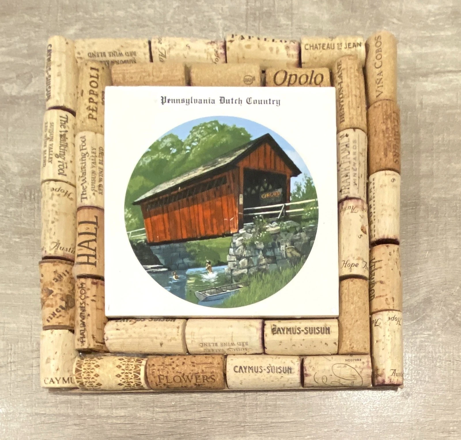 Pennsylvania Dutch Country covered bridge artwork in a wine cork frame